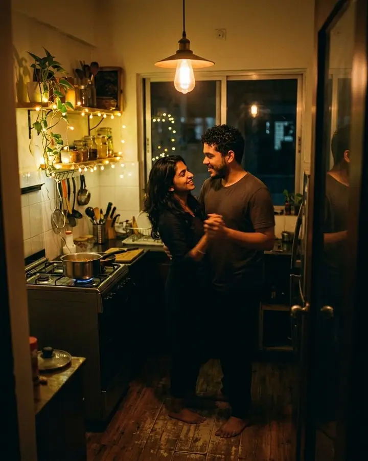 AI example of a couple slow-dancing in a warm kitchen at night